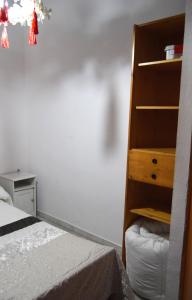 Ein Bett oder Betten in einem Zimmer der Unterkunft Apartamento Feria 2