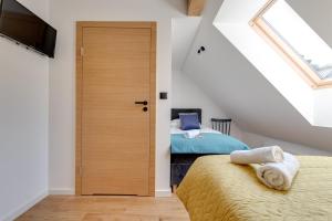 Posteľ alebo postele v izbe v ubytovaní Biała Owieczka B&B Szczyrk