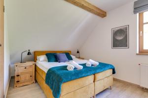 Posteľ alebo postele v izbe v ubytovaní Biała Owieczka B&B Szczyrk