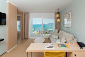 A television and/or entertainment centre at HSM Golden Playa