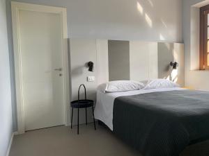 Säng eller sängar i ett rum på Locanda della Posta