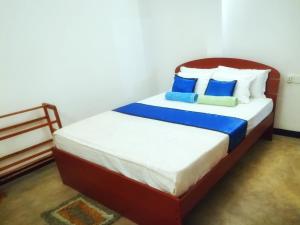 En eller flere senge i et værelse på Temple Hill Rooms