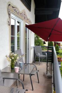 Patio alebo iná vonkajšia časť ubytovania FeWo Leeb