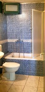 Ένα μπάνιο στο Boutique Home Saltaragazza