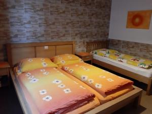 Posteľ alebo postele v izbe v ubytovaní Almhaus Florian