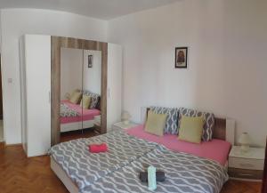 Postel nebo postele na pokoji v ubytování Apartment Onix