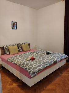 Postel nebo postele na pokoji v ubytování Apartment Onix