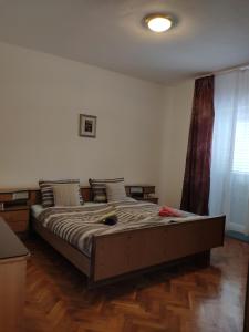 Postel nebo postele na pokoji v ubytování Apartment Onix
