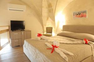 Katil atau katil-katil dalam bilik di Afrodite Luxury Suite