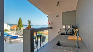 Balkón alebo terasa v ubytovaní Exclusive Villa Mative
