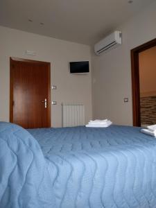 Postel nebo postele na pokoji v ubytování B&B Alba sul Mare Guest House