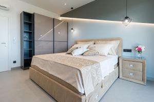 Posteľ alebo postele v izbe v ubytovaní Exclusive Villa Mative
