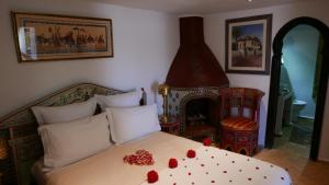 Uma cama ou camas num quarto em Dar Sultan