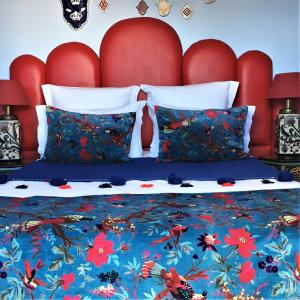 Uma cama ou camas num quarto em Dar Sultan