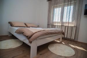 Postel nebo postele na pokoji v ubytování Guesthouse Buco