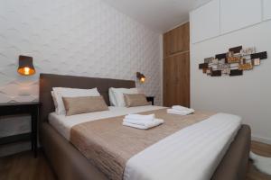 Postelja oz. postelje v sobi nastanitve Cicibela Apartment - Zadar