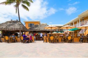 A restaurant or other place to eat at Riptide Oceanfront Hotel