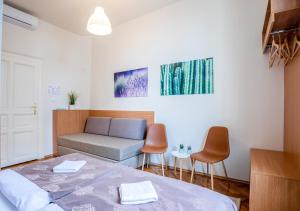 Letto o letti in una camera di Booking En Suite