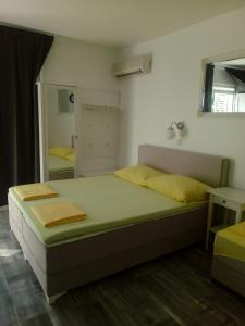 Кровать или кровати в номере Villa Ani