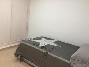 Łóżko lub łóżka w pokoju w obiekcie Casa Luz