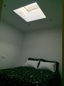 Łóżko lub łóżka w pokoju w obiekcie Casa Luz