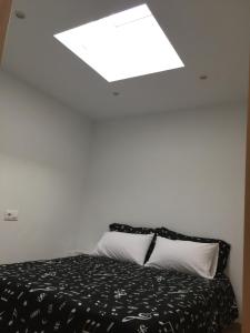 Łóżko lub łóżka w pokoju w obiekcie Casa Luz