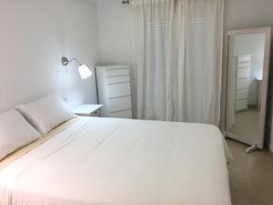 Łóżko lub łóżka w pokoju w obiekcie Casa Luz