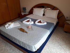 Postel nebo postele na pokoji v ubytování POPI 'S HOME