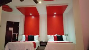 Postel nebo postele na pokoji v ubytování Hotel Dluxe + 37 fotografií