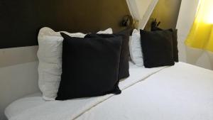 Postel nebo postele na pokoji v ubytování Hotel Dluxe