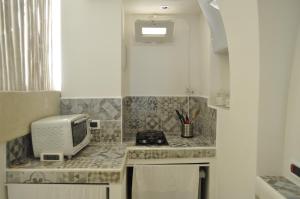 A kitchen or kitchenette at Latorreangioina