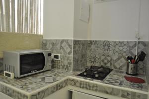 A kitchen or kitchenette at Latorreangioina