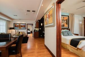 Ένα ή περισσότερα κρεβάτια σε δωμάτιο στο Hotel Palma Real