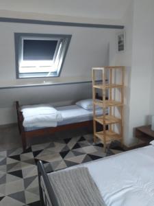 เตียงในห้องที่ Appartement La Nacre vue mer éloignée