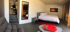 Кровать или кровати в номере THE ADDRESS CASSIS