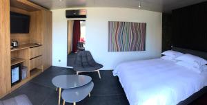 Кровать или кровати в номере THE ADDRESS CASSIS