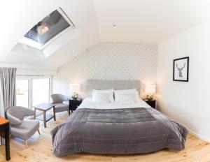 Postel nebo postele na pokoji v ubytování Chez Spoons B&B
