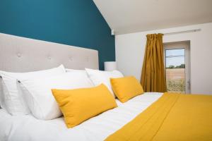Postel nebo postele na pokoji v ubytování Chez Spoons B&B