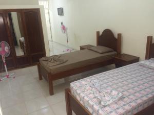 Cama o camas de una habitación en Pensao Motel Sodade