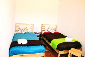Кровать или кровати в номере Monte Costa LuZ