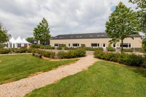 Κήπος έξω από το Vakantiehuizen 7Huizen aan Zee