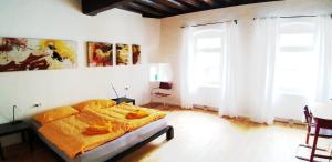 Postel nebo postele na pokoji v ubytování Renaissance Apartment Marktplatz