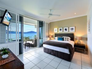 Ένα ή περισσότερα κρεβάτια σε δωμάτιο στο Hibiscus Apartments on Hamilton Island by HIHA +49 φωτογραφίες