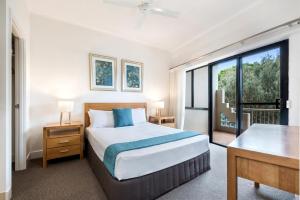 Voodi või voodid majutusasutuse Mirra Chana Beachfront Apartments Mooloolaba toas