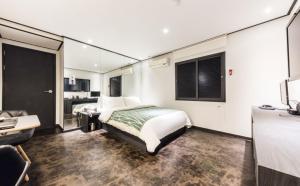 Krevet ili kreveti u jedinici u okviru objekta Gugi Motel