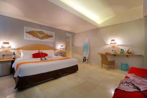 เตียงในห้องที่ Koa D Surfer Hotel