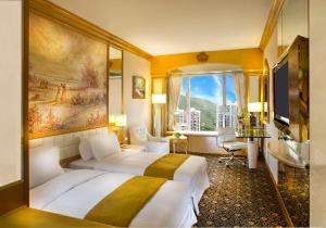 TV a/nebo společenská místnost v ubytování Regal Hongkong Hotel