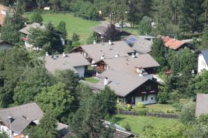 an aerial view of a house in a village at Residence Silvester in Racines