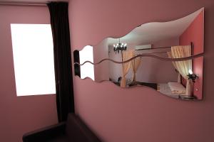 Kuvagallerian kuva majoituspaikasta Bedrooms Ninfa Del Lago, joka sijaitsee Posta Fibrenossa