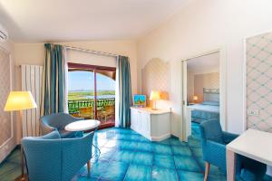 Posezení v ubytování Hotel Santa Gilla
